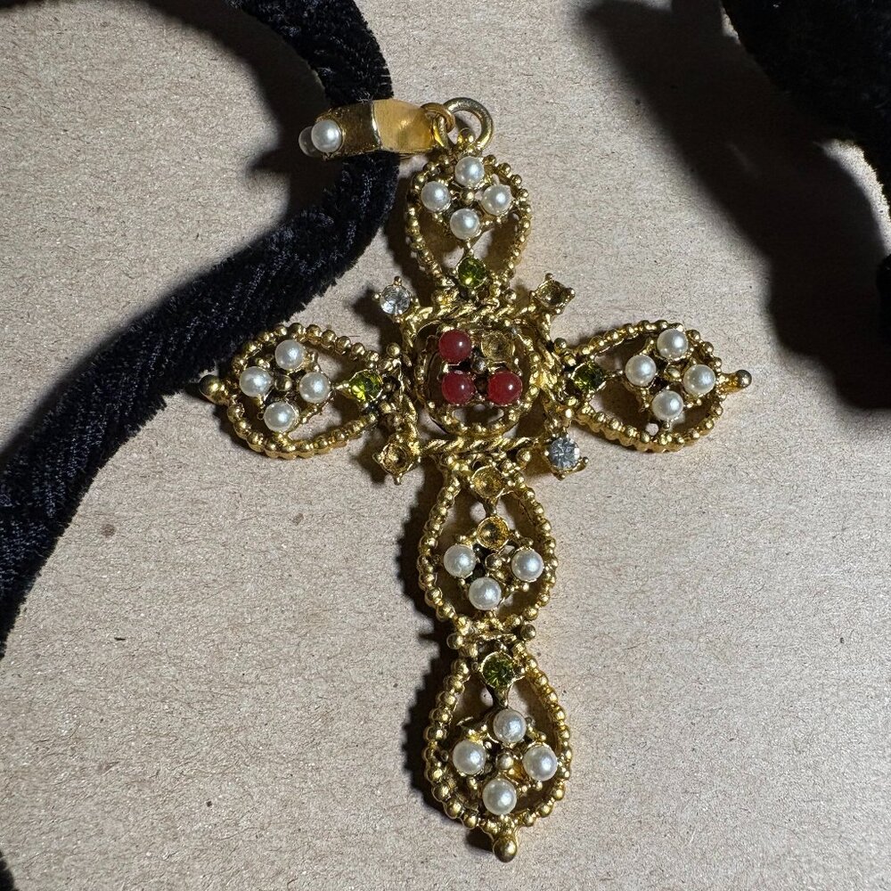 Vintage Gerard Yosca gold cross pendant on a black velvet rope signed